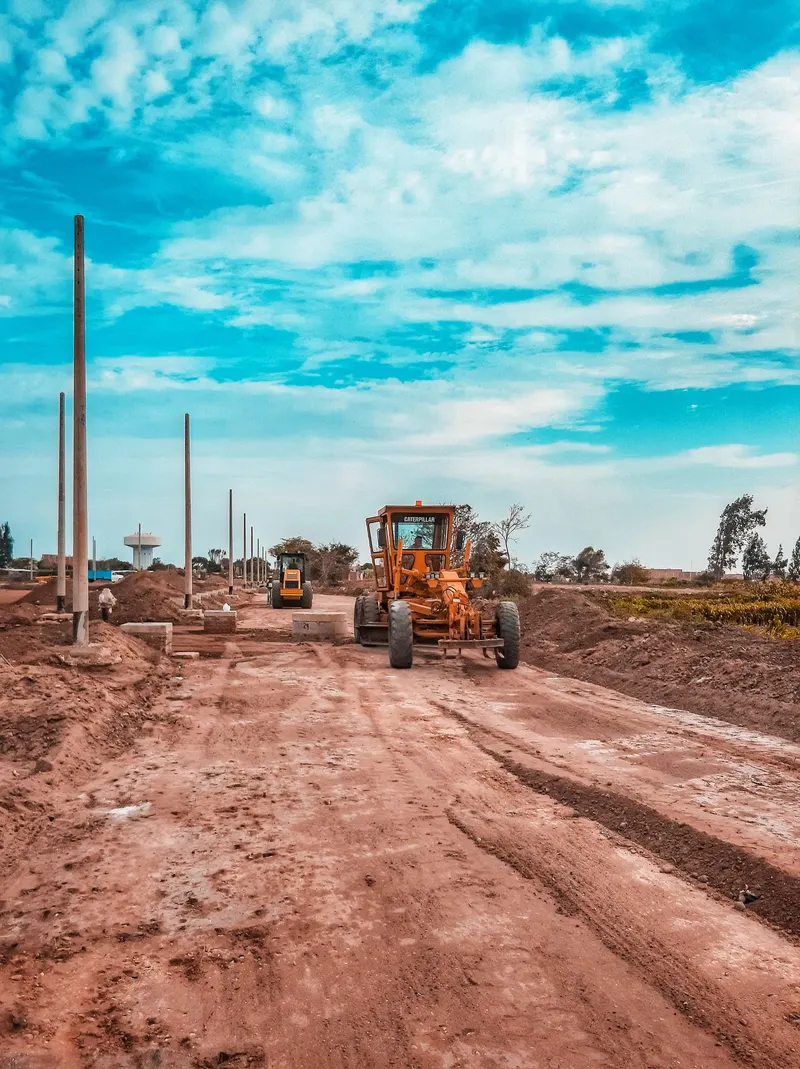 Cutting a road to grade